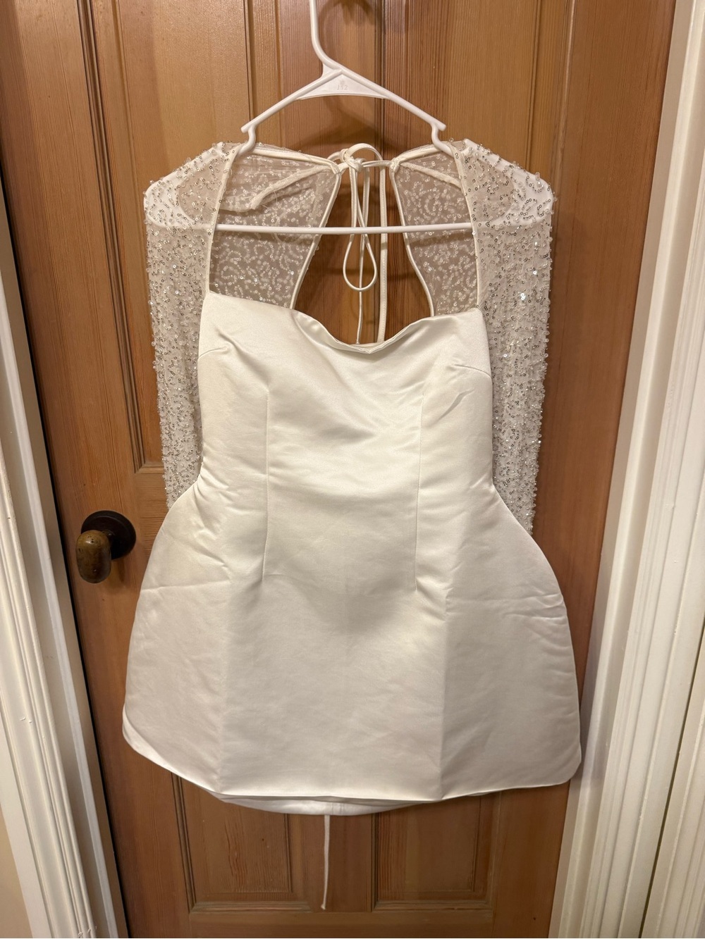 Elegant White Strapless Mini Dress with Beaded Capelet